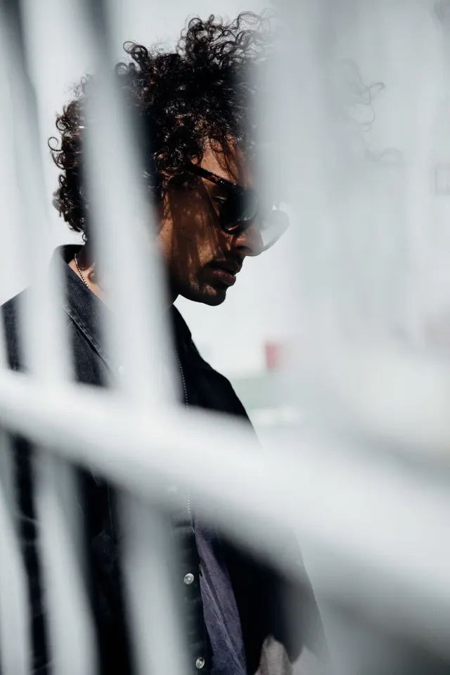 Abstract Portrait through Blinds, photographic, minimal, dark