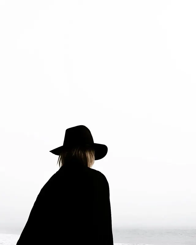 Silhouette of a Person in a Hat, minimal, monochrome, monochrome