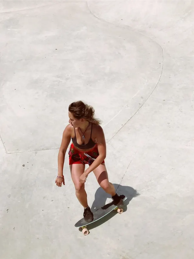 Skateboarder in Motion, photographic, minimal, light