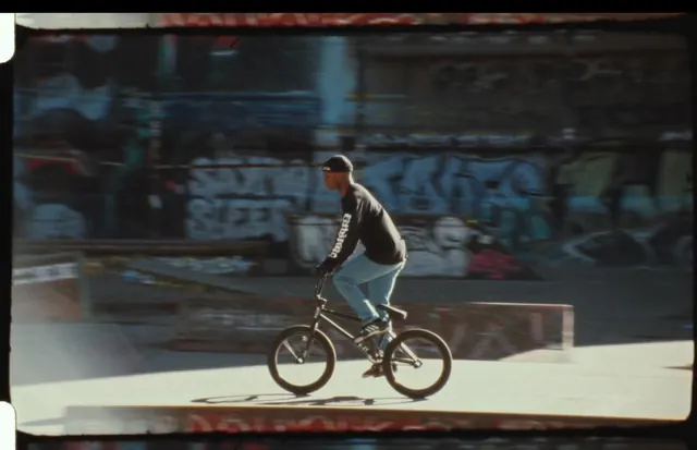 Skater in Urban Environment, photographic, brutalist, dark