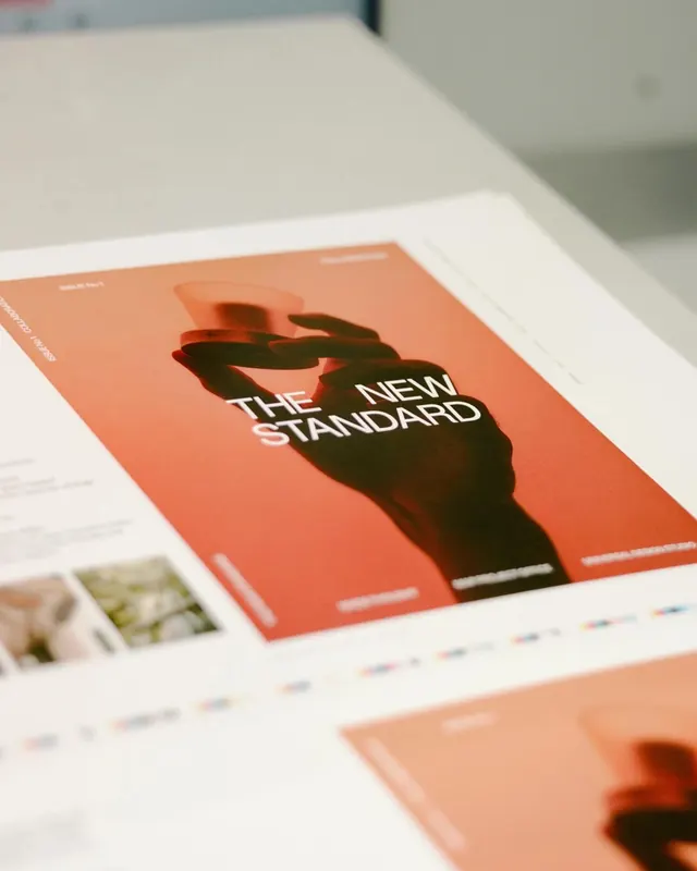 The New Standard magazine cover print proof, editorial, minimal, warm