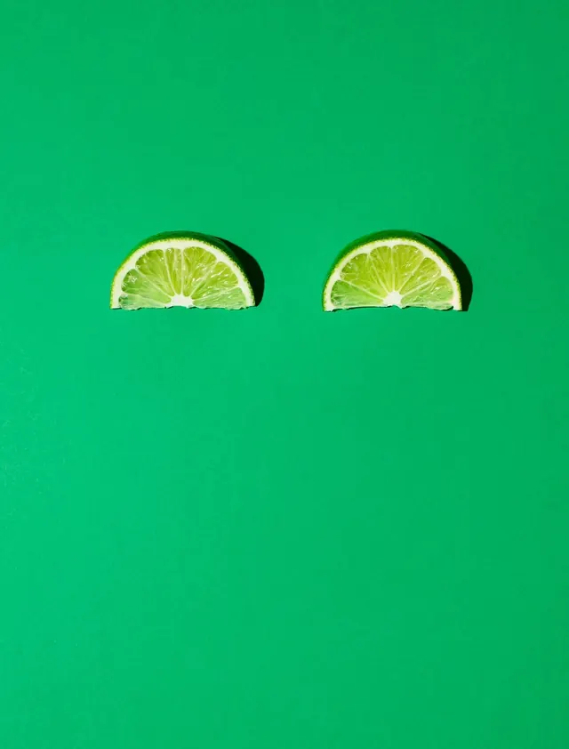 Lime Slices on Green Background, minimal, organic, vibrant