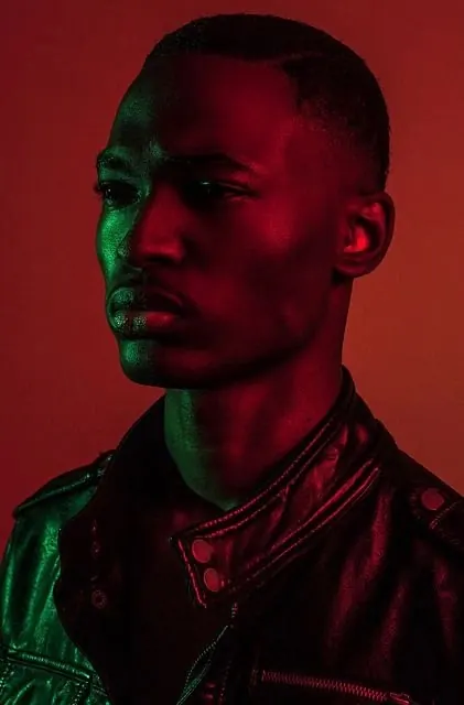 Red-Toned Portrait of a Man in Leather Jacket, photographic, dark-mode, dark