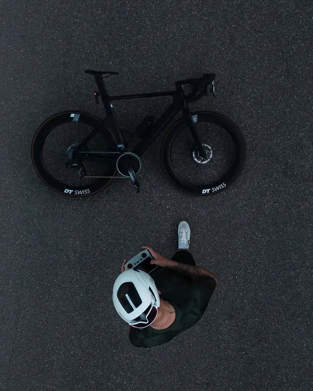 Road Bike and Helmet Mockup, minimal, photographic, dark