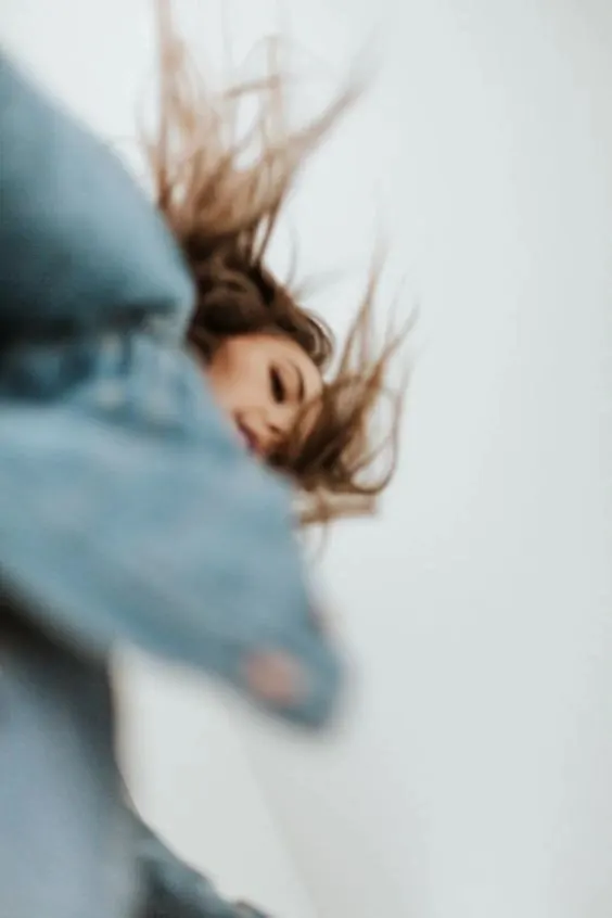 Motion Portrait of a Woman in Denim, photographic, organic, cool
