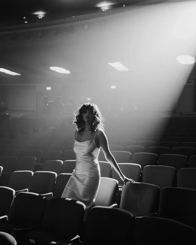 Woman in Theater Spotlight, monochrome, photographic, monochrome