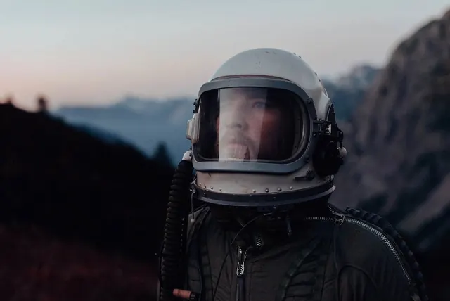 Person in White Helmet Outdoor Portrait, photographic, minimal, dark