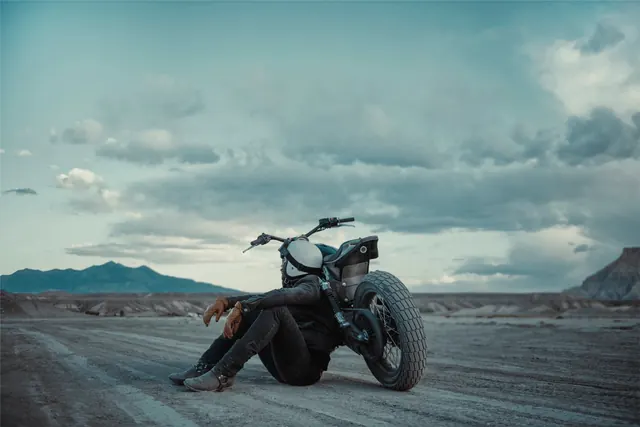 Motorcycle in Desert Landscape, photographic, minimal, muted
