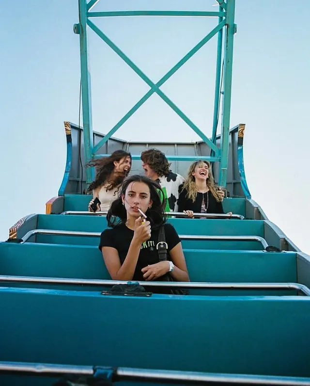 Group Portrait on Blue Structure, photographic, playful, vibrant