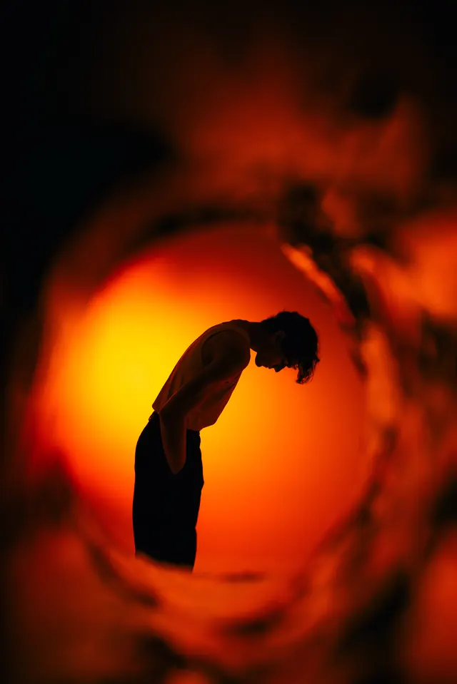 Silhouette in a Fiery Portal, abstract, photographic, warm