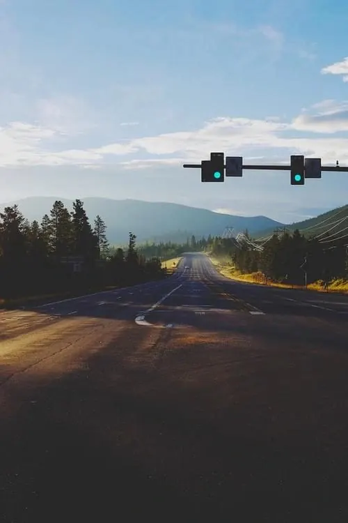 Mountain Road Traffic Light Scene, photographic, minimal, dark