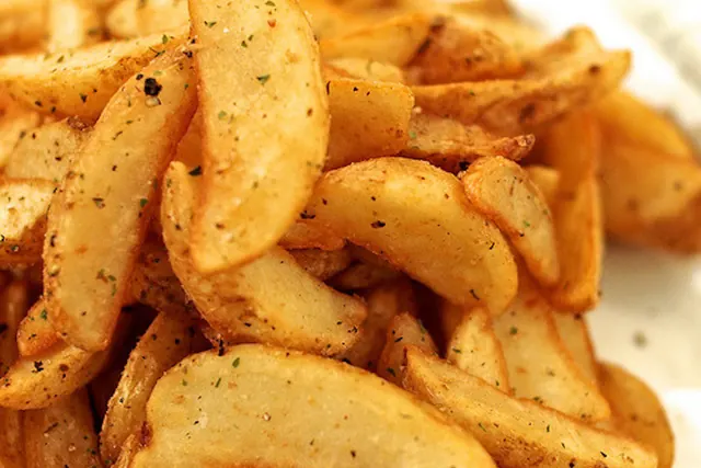 Close-up of Fried Potato Chips, photographic, organic, warm