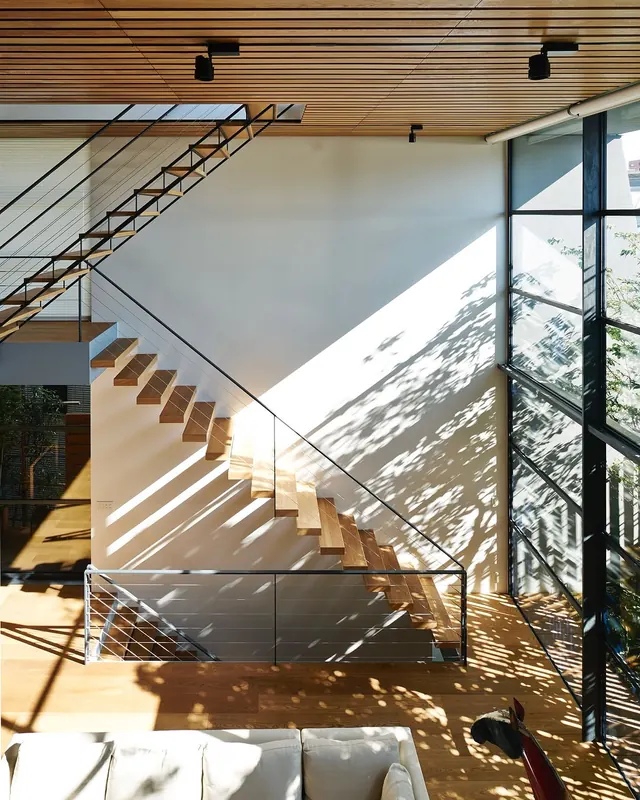 Modern Industrial Interior with Staircase, minimal, photographic, warm