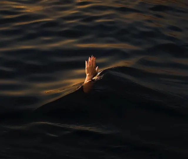 Hand Emerging from Water, photographic, minimal, dark