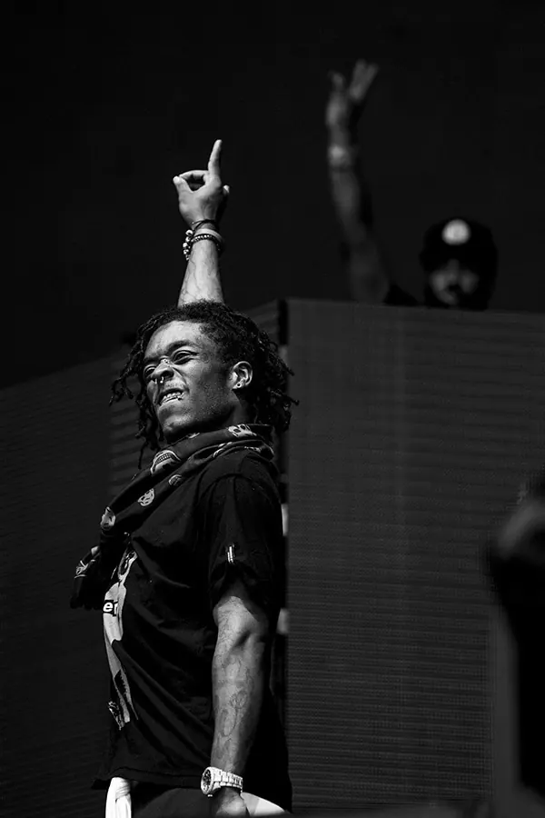 Monochrome Portrait of a Man with Raised Hand, monochrome, photographic, monochrome