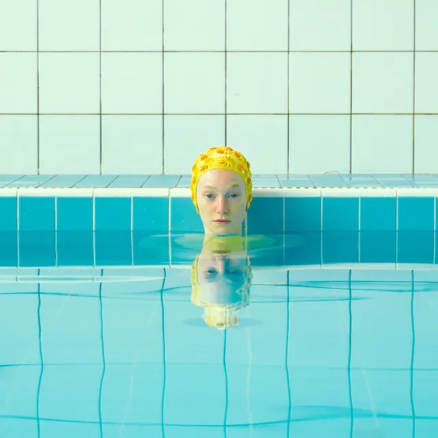 Yellow-Haired Girl in Swimming Pool, minimal, photographic, vibrant