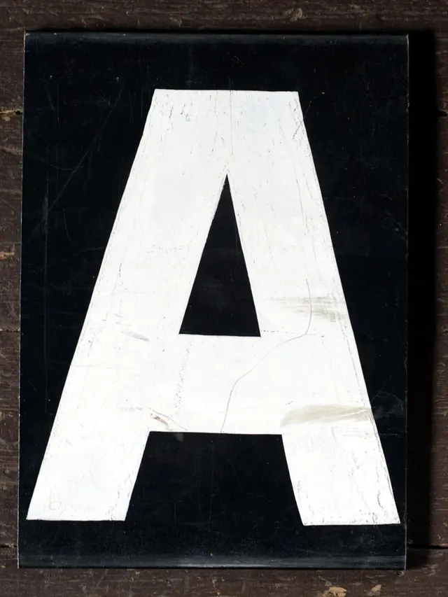 Large White Letter A on Black Background, minimal, brutalist, high-contrast