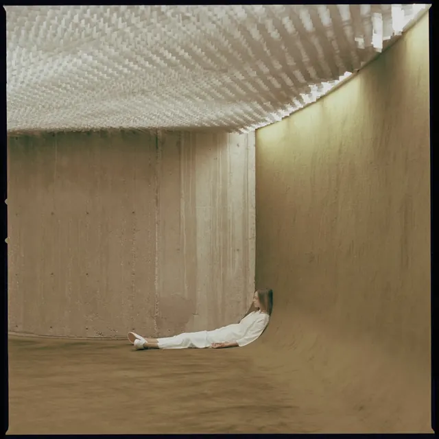 Human Figure in Textured Architectural Space, minimal, photographic, warm