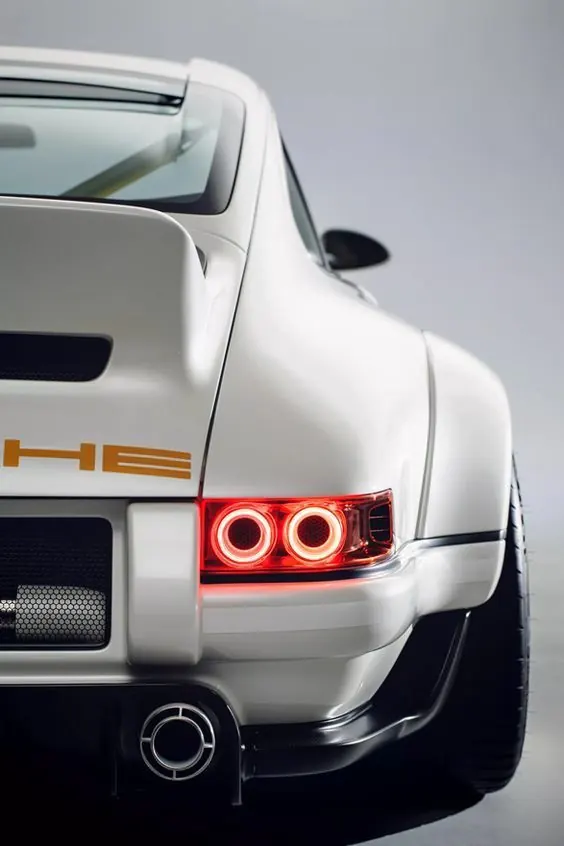White Sports Car with Red Accents, photographic, luxury, light