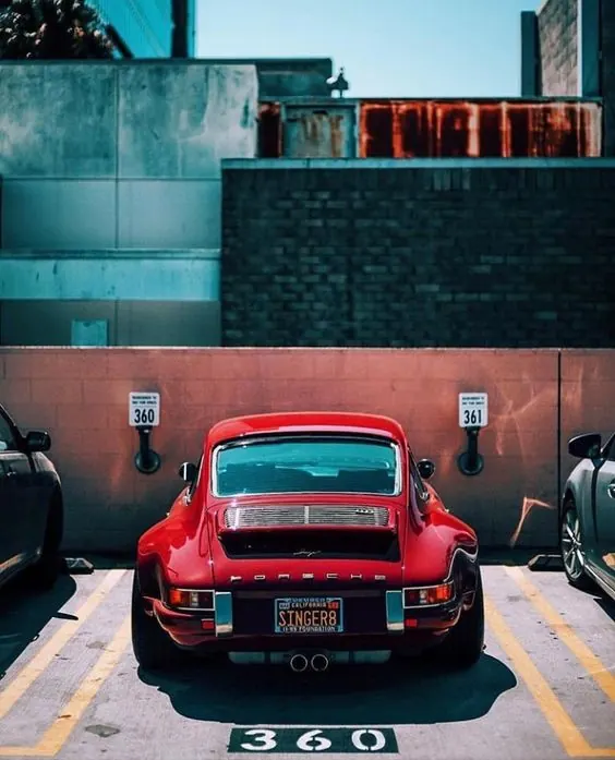 Red Sports Car in Urban Setting, minimal, geometric, vibrant