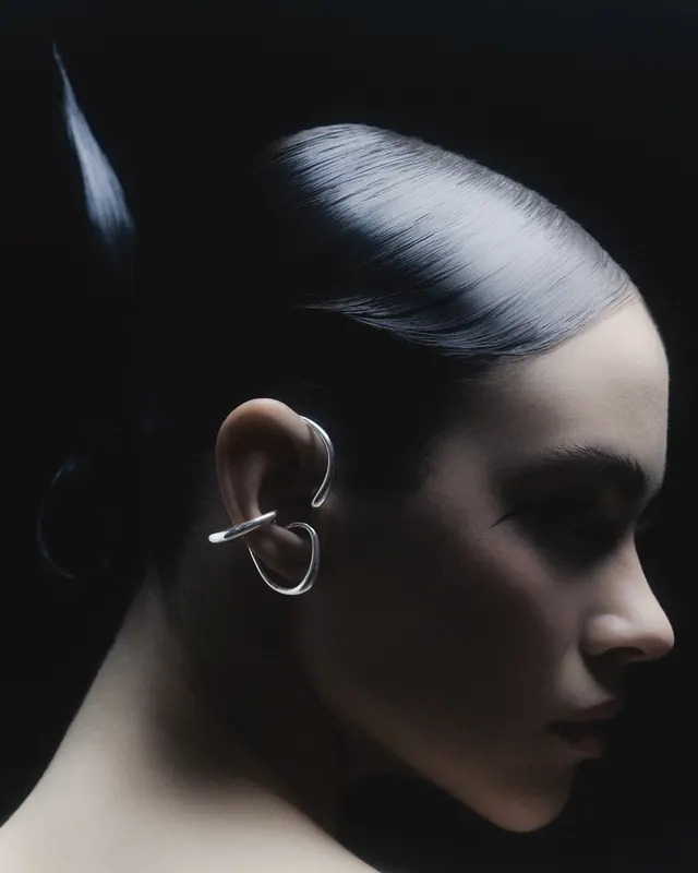 Stylized Portrait with Earring, minimal, luxury, dark