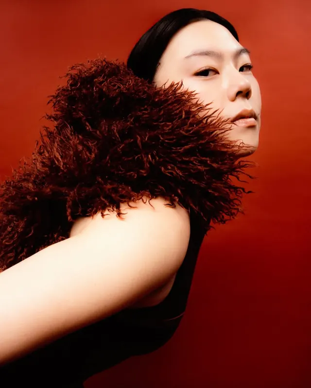 Portrait of a Woman in Fur, photographic, luxury, vibrant