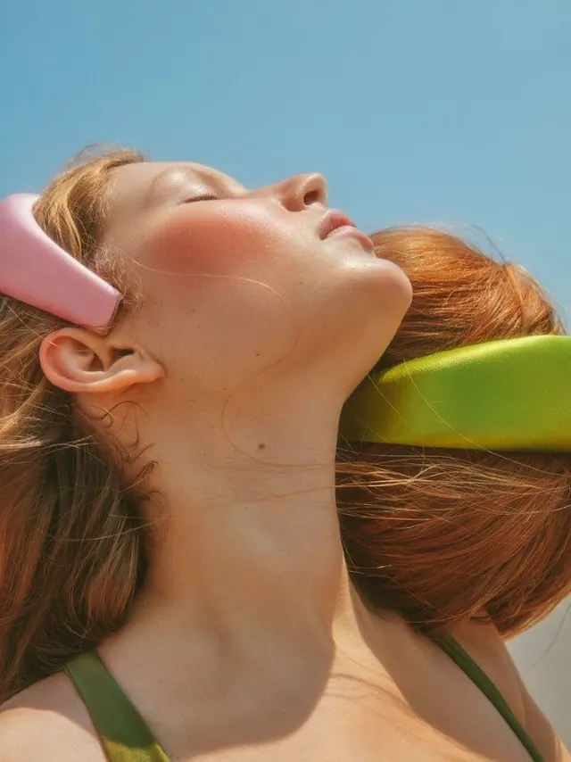 Close-up Portrait of a Woman with Colorful Accessories, photographic, organic, vibrant