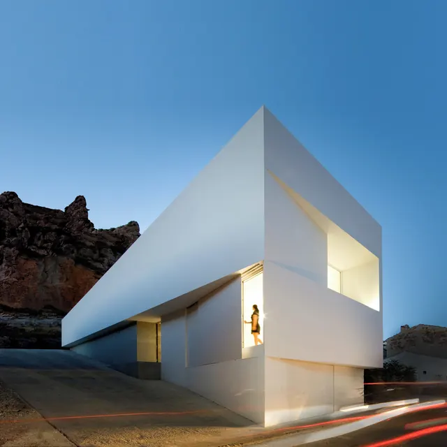 Modernist Architectural Structure in Desert Landscape, minimal, geometric, high-contrast