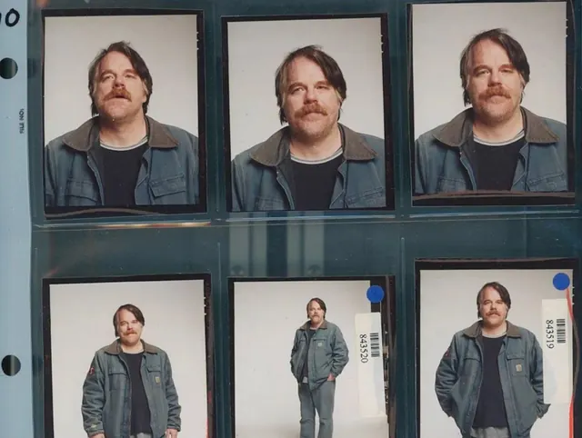 Grid of Portraits in Frames, boxed, photographic, dark