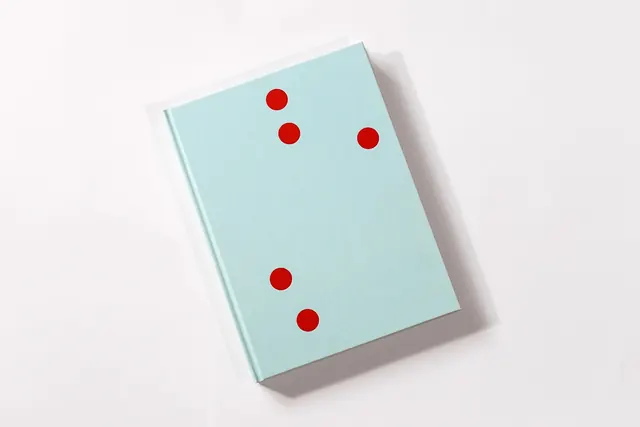 Minimalist Blue Book Mockup with Red Dots, minimal, flat, light
