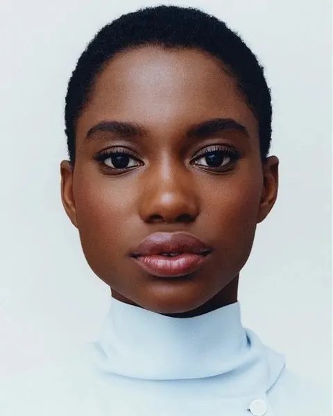 Portrait of a Woman in Blue Turtleneck, photographic, minimal, light
