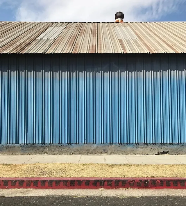 Corrugated Metal Building Exterior, photographic, brutalist, cool