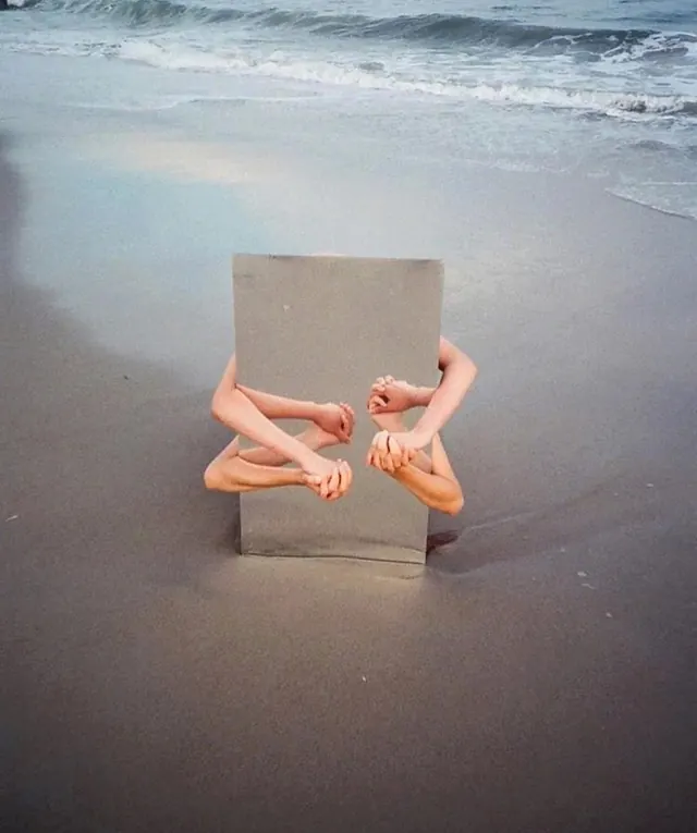 Human Figure on Beach with Rectangular Block, minimal, photographic, muted