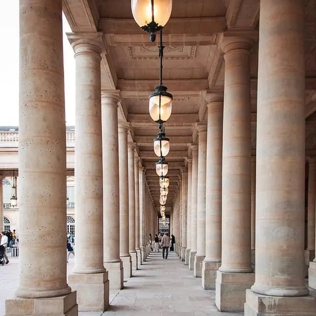 Neoclassical Colonnade with Hanging Lanterns, photographic, luxury, warm