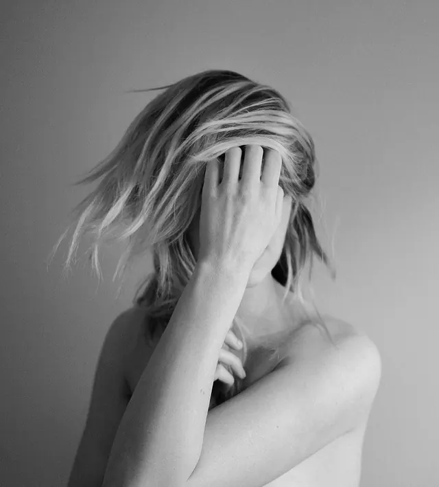 Monochrome Portrait of a Woman with Hair Over Face, minimal, monochrome, monochrome