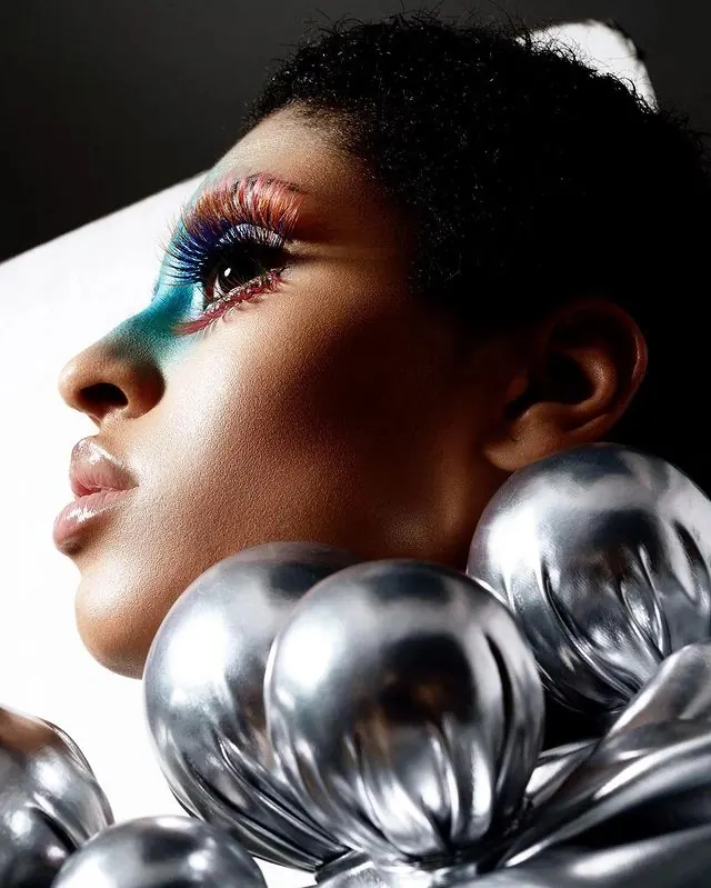 Artistic Portrait with Metallic Spheres, luxury, photographic, vibrant