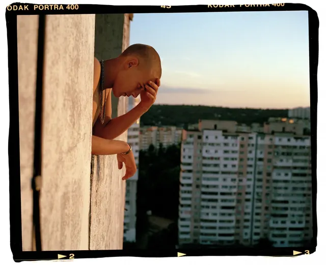 Man on Balcony Photography, photographic, minimal, warm