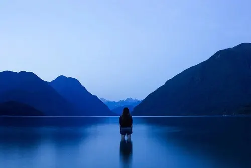 Lone Figure in Mountain Lake, minimal, photographic, cool