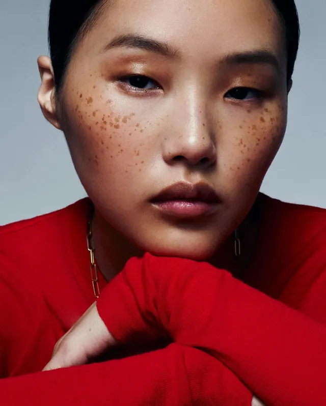 Portrait of a Woman in Red, photographic, minimal, vibrant