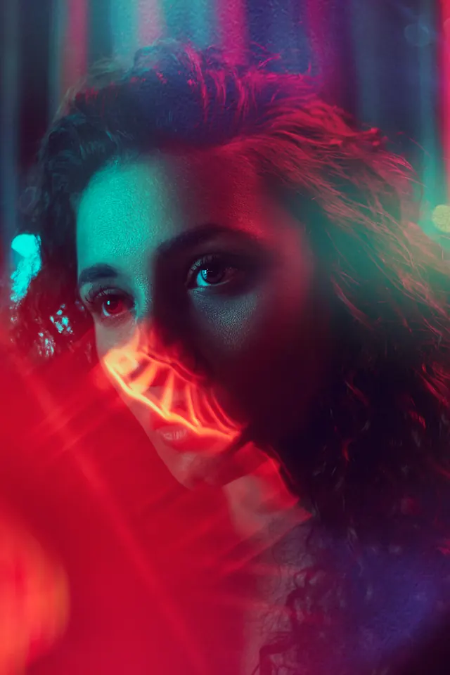 Neon Portrait with Red Overlay, photographic, gradient-heavy, vibrant