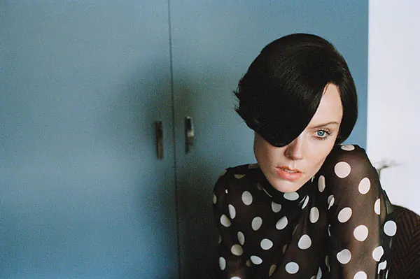 Woman in Polka Dot Dress Portrait, photographic, minimal, cool