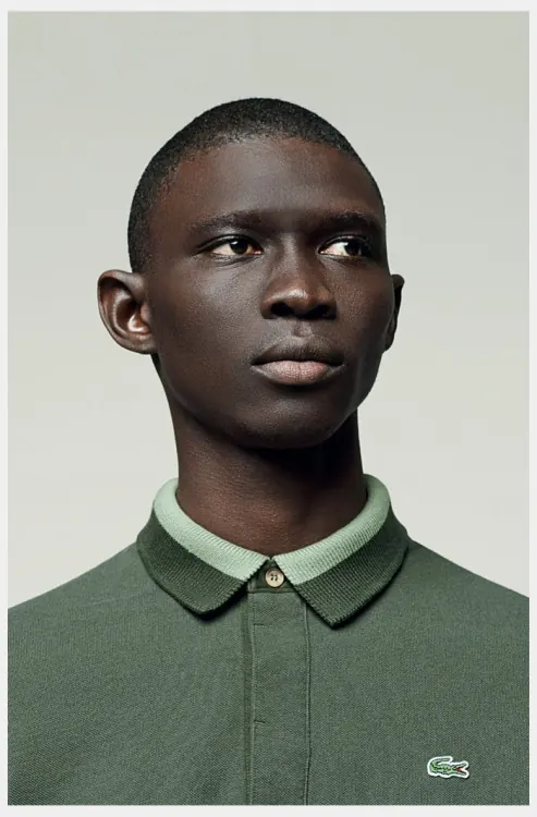 Portrait of a Man in a Green Shirt, photographic, minimal, muted