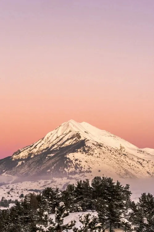 Snow-Capped Mountain at Sunset, photographic, minimal, pastel