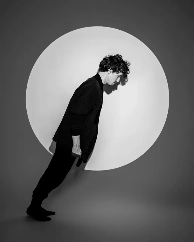 Man in Circular Frame Portrait, minimal, monochrome, monochrome