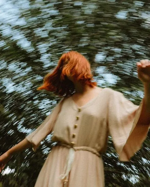 Woman in Motion with Motion Blur, photographic, organic, earthy