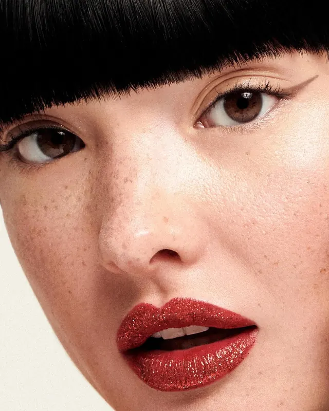 Close-up Portrait of a Woman with Freckles, photographic, organic, warm
