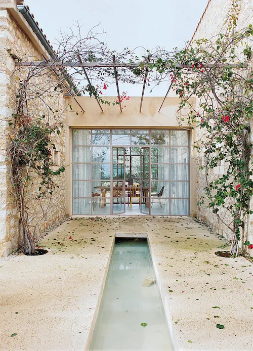 Modern Courtyard with Water Feature, minimal, photographic, light