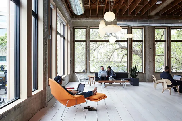 Modern Office Interior with Collaborative Workspace, photographic, minimal, warm