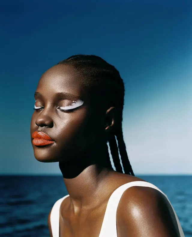 Portrait of a Woman with White Eye Makeup, photographic, luxury, high-contrast
