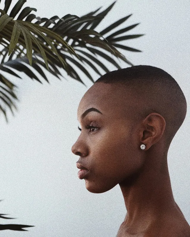Portrait of a Woman with Palm Leaf, minimal, photographic, muted